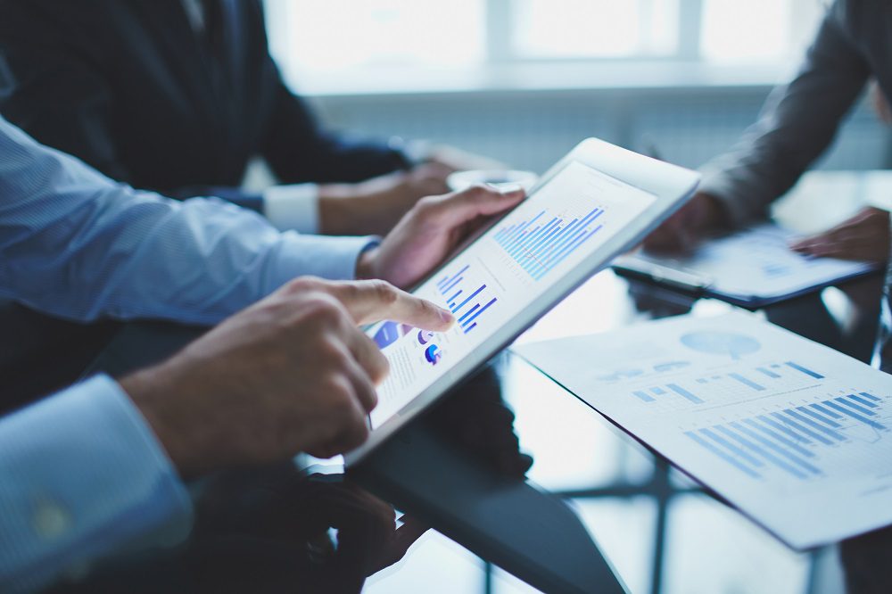 close up of businessman with digital tablet